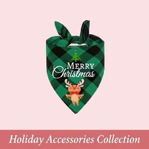 Close-up of green plaid Christmas dog bandana with reindeer print and Merry Christmas text