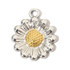 Macro view of a stainless steel daisy pendant with silver petals and golden center