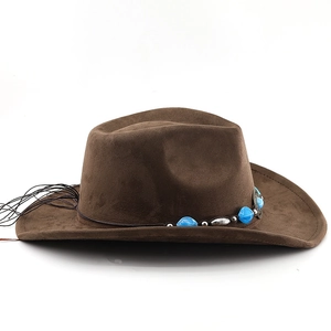 Detail of brown suede cowboy hat featuring ethnic beads and black fringe trim
