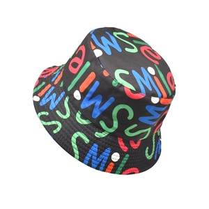 Unisex bucket hat with vibrant colorful SMILE graffiti print on a black cotton canvas base