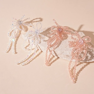 Sweet crystal bowknot tassel earrings in transparent white and light pink colors