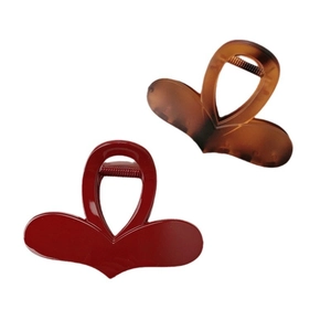 Minimalist red and tortoiseshell heart hair claws on a clean white background