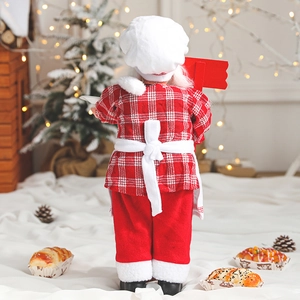 Back view of a Christmas Santa chef doll in red plaid fabric with white apron and hat