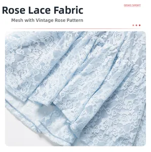 Macro detail of rose lace fabric and breathable mesh splicing on light blue dress