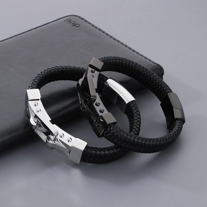 Set of men's black woven leather bracelets with silver and gunmetal magnetic clasps