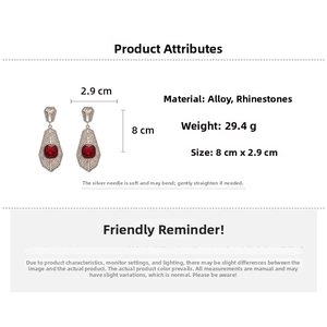 Detail view of red square rhinestone drop earrings with 8cm x 2.9cm dimensions