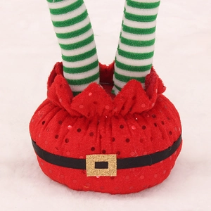 Christmas elf legs decoration with sequins and plush fabric for festive indoor holiday party decor