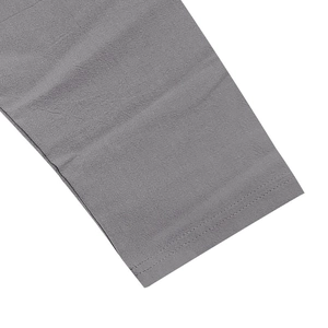 Detail of grey linen shirt cuff showing high-quality double-needle stitching and fabric texture