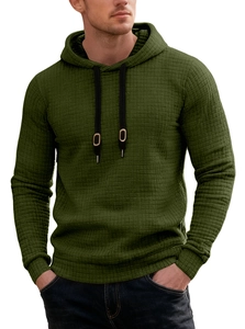 Detail of green waffle knit texture and drawstring hood on men's casual long sleeve hoodie