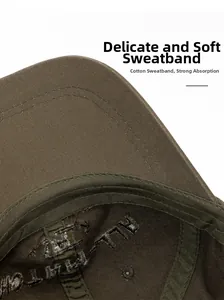 Detail of olive green cotton baseball cap showing internal sweatband and embroidery