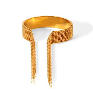 Detailed view of luxury gold fringe choker with metallic beaded textures and long tassels