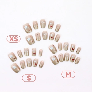 Lot de 30 faux ongles mignons avec motifs cœur et nœud en tailles XS, S, M