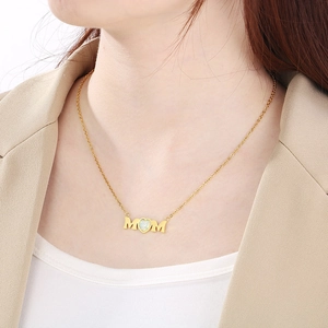 Gold MOM heart opal pendant necklace for women shown on neck for Mother's Day gift