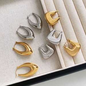 Minimalist U-shaped and geometric hollow metal earrings in gold and silver finishes