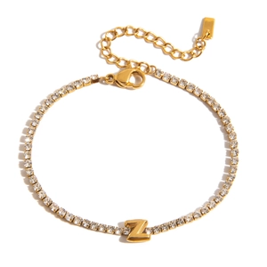 Detailed close-up of 18K gold-plated tennis bracelet with sparkling zircon letter Z charm