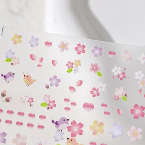 Floral nail art stickers with cherry blossoms, birds and hearts in pastel colors