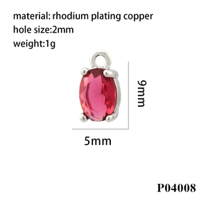 Detail view of red oval zircon pendant charm in rhodium plated copper with 9x5mm dimensions