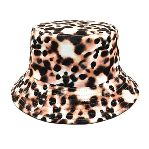 Detailed close-up of leopard print pattern on high-quality canvas bucket hat