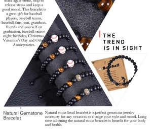 Detail view of 8mm matte black onyx and tiger eye stone bracelet with baseball charm