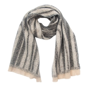 Detail of soft loop yarn scarf with grey and beige geometric jacquard stripes and fringe