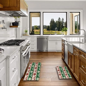 Two-piece Christmas flannel kitchen mat set with reindeer and snowflake patterns