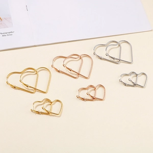 Hollow heart hoop earrings with twisted texture in gold, silver and rose gold