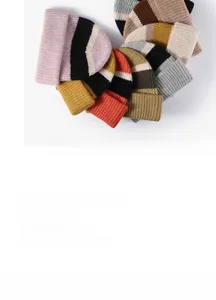 Collection of colorful striped winter beanies with soft ribbed knit texture