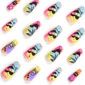 Graffiti style long trapezoid press-on nails with skull and colorful heart patterns
