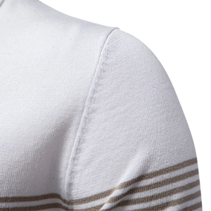 Close-up of men's white and brown striped knit polo shirt showing shoulder seam detail