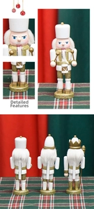 Detail of 15cm white and gold wooden nutcracker puppets with glitter coating for Christmas