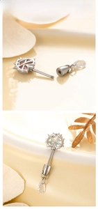 Detailed macro view of thorn heart ear studs with titanium steel screw back design