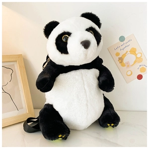 Close-up of soft plush panda shoulder bag with black strap and metal zipper detail
