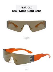 Detail of shield sunglasses with tawny gold mirror lenses and bold orange temples