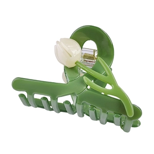 Elegant green tulip acetate hair claw clip with white flower design for women