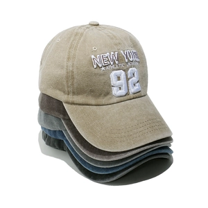 Vintage New York embroidered baseball caps in khaki, grey, blue, and black cotton
