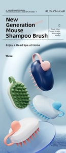 Detail view of ergonomic mouse-shaped hair scalp massage brushes in four distinct colors
