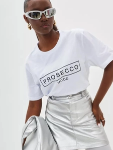 White cotton t-shirt with Prosecco Mood print paired with metallic silver skirt