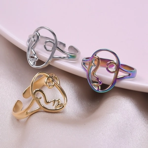 Artistic abstract face open rings set in silver, gold and rainbow polished finish