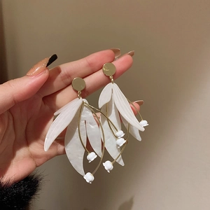 Elegant white lily of the valley and leaf petal earrings in golden finish style