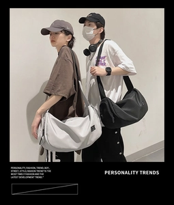 Neutral street style crossbody hobo bag in black and grey for travel and fitness
