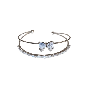 Double-layered silver open bangle with zircon bow and heart accents for women