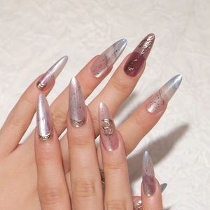 3D cat eye stiletto press-on nails with gold foil moon and star metallic details