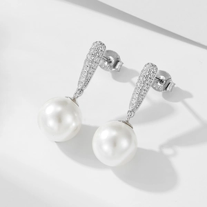 Elegant S925 sterling silver pearl drop earrings with micro-set zircon accents
