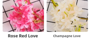 Detalle de enredadera de jazmín artificial en rosa y blanco para decoración de casa