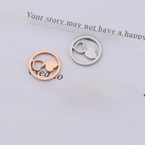 Three hollow circular heart pendants in rose gold, silver, and gold stainless steel finishes