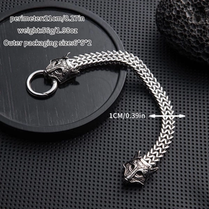 Detail of viking wolf head bracelet with 21cm circumference and wheat chain texture