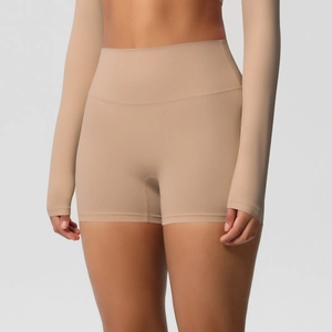 Close-up of nude high-waisted seamless yoga shorts showing matte texture and tummy control