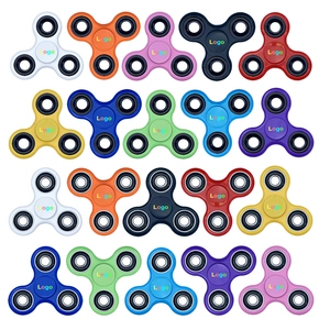 Colorful tri-wing fidget spinners set in twenty vibrant colors on a white background