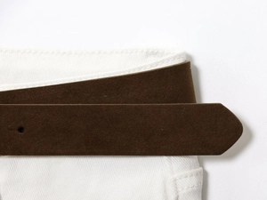 Detail of a dark brown suede belt with fine texture and premium stitching finish