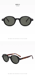 Detail view of retro round sunglasses featuring tortoiseshell temples and polarized lenses